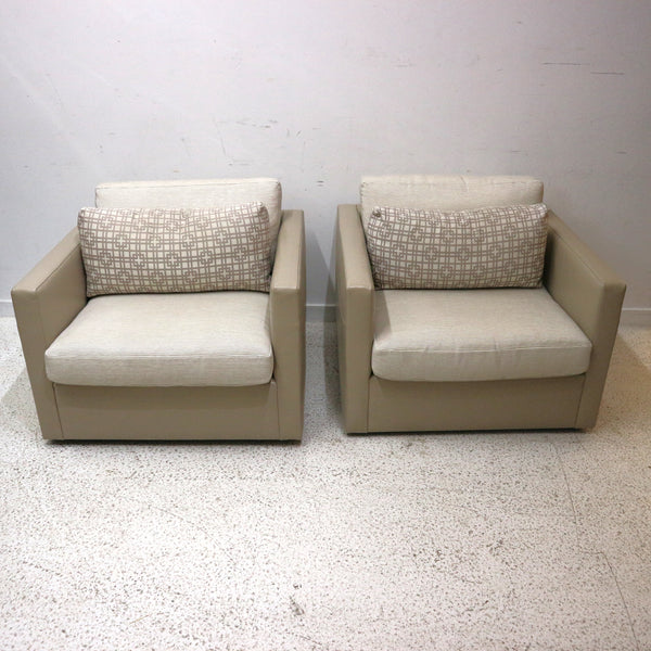 Pair of Custom Leather Wrapped Swivel Chairs