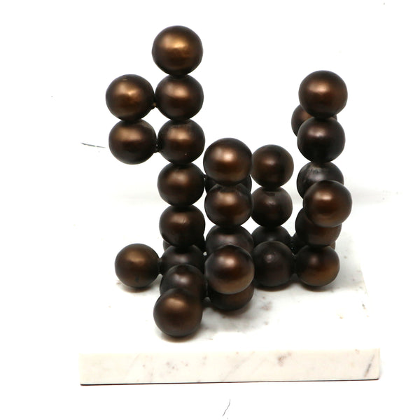 Stacked Spheres on Marble Base